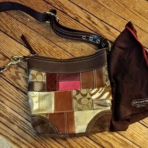 Coach cross body with draw string matching bag